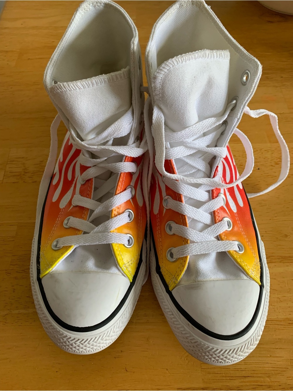 Converse Chuck Taylor All Star high top sneakers with flame design